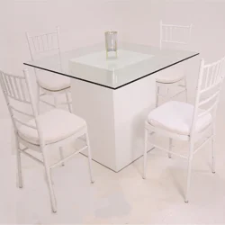white-chivari-with-glass-dining-table